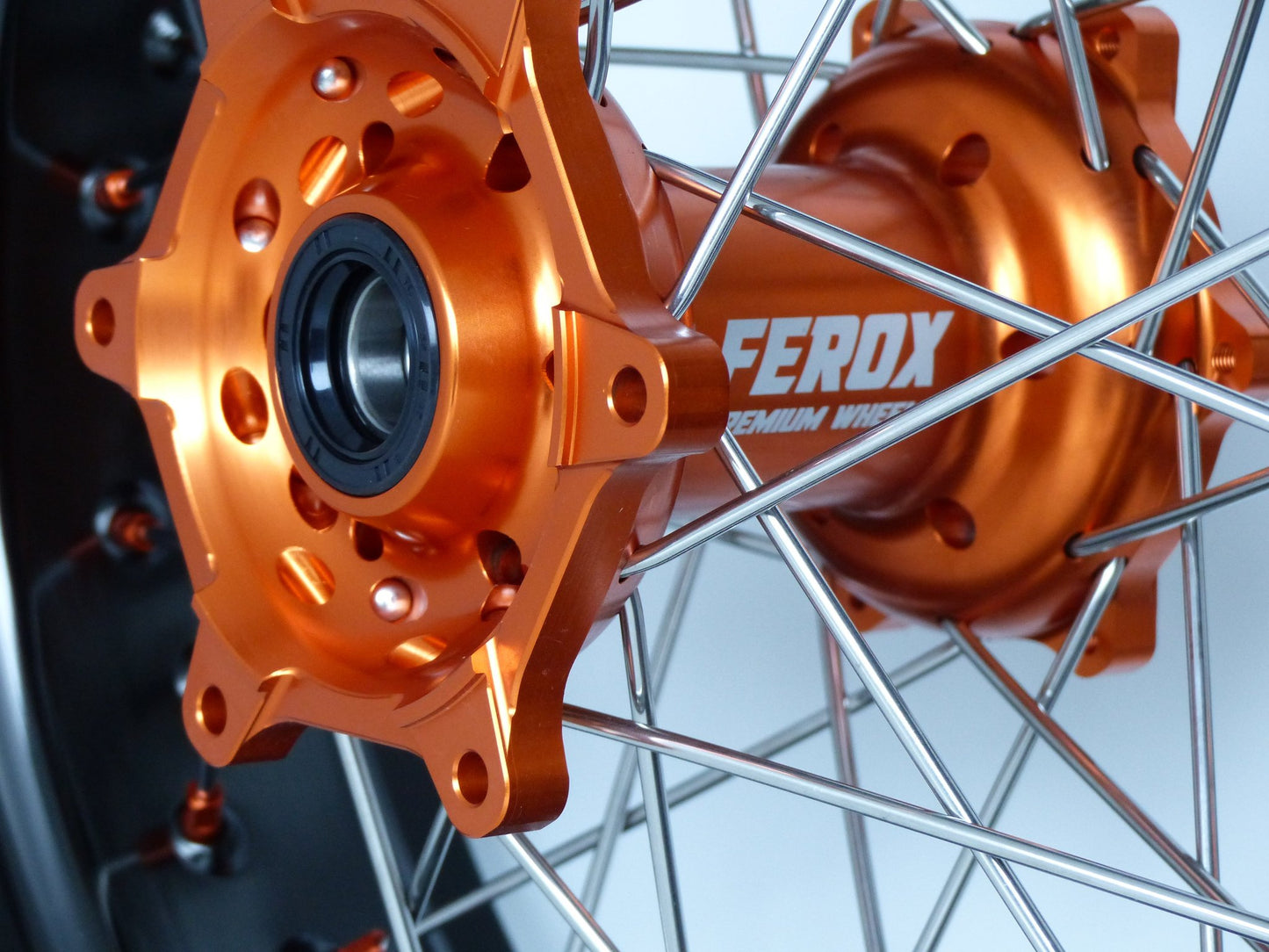 Black rim, Silver spokes, Orange nipples, Orange hub