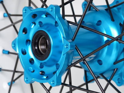White rim, Black spokes, Light Blue nipples, Light Blue hub